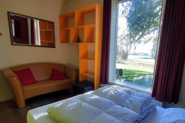 De Opkikker 10 Persoons Vakantiehuis Met Hottub ヒートホールン エクステリア 写真